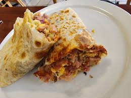 Palacio Café signature dishes Smothered Breakfast Burrito
Grilled Burger
Cuban Reuben